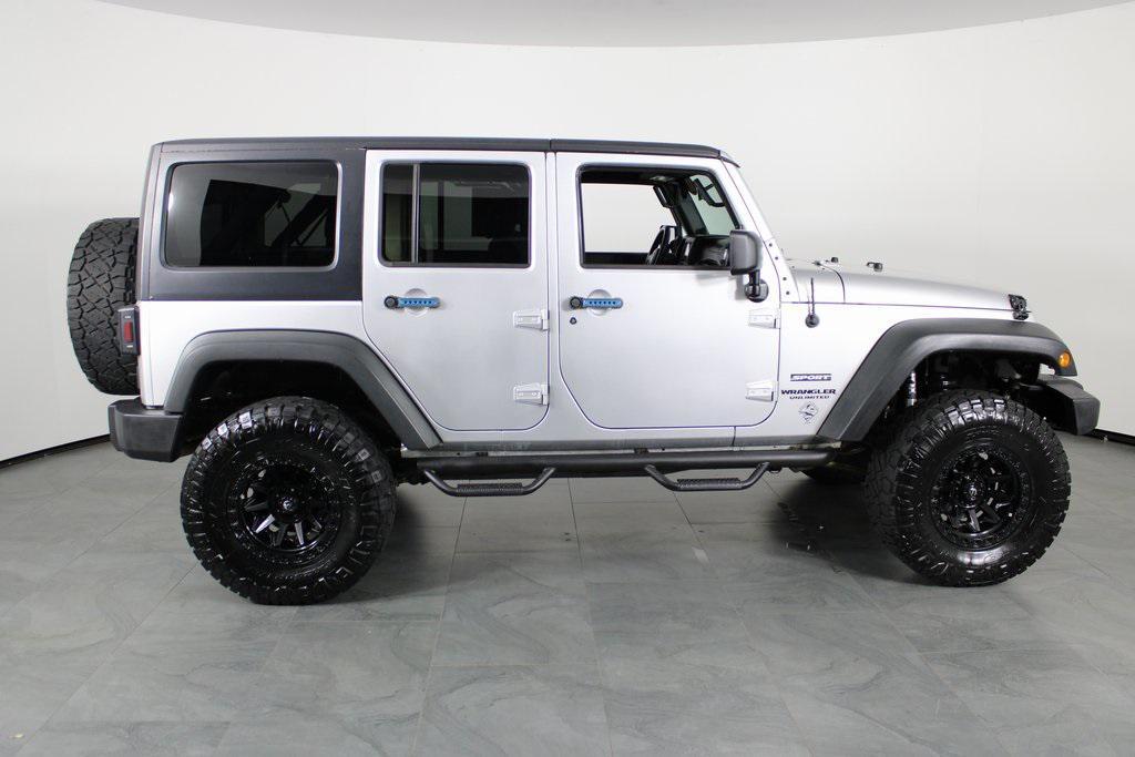 used 2011 Jeep Wrangler Unlimited car, priced at $12,987