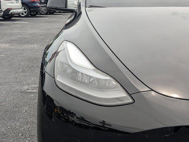 used 2024 Tesla Model Y car, priced at $37,826