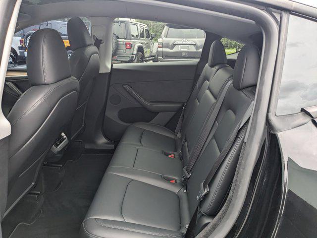 used 2024 Tesla Model Y car, priced at $37,826