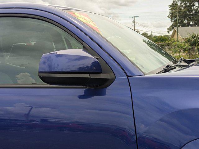 used 2023 Toyota Tacoma car, priced at $30,556
