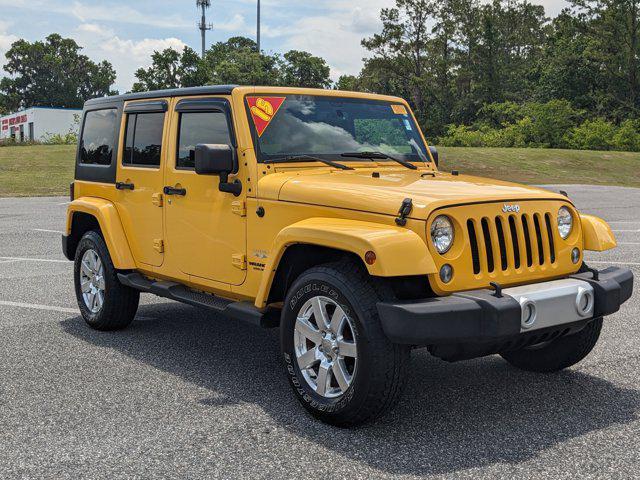 used 2015 Jeep Wrangler Unlimited car, priced at $17,504