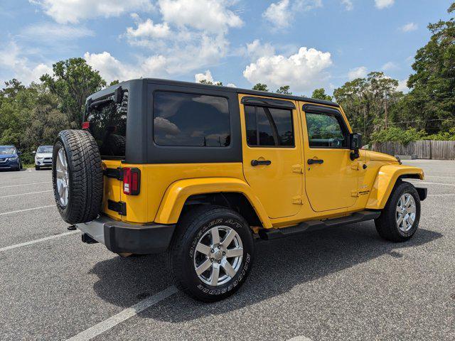 used 2015 Jeep Wrangler Unlimited car, priced at $17,504