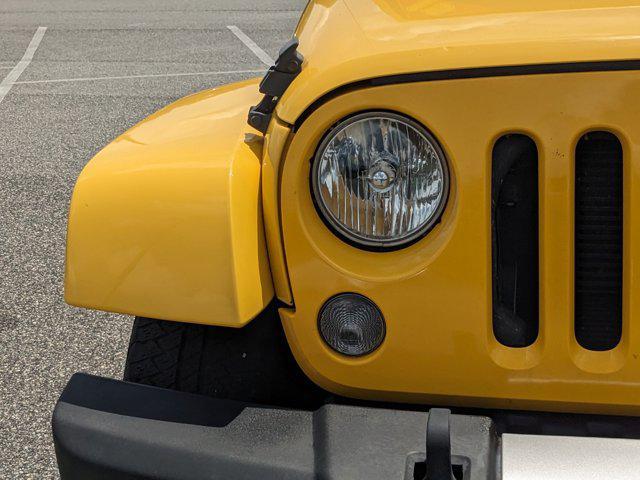 used 2015 Jeep Wrangler Unlimited car, priced at $17,504