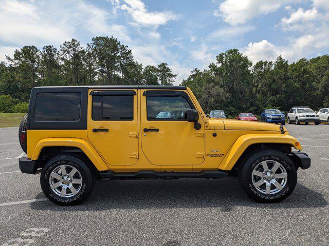 used 2015 Jeep Wrangler Unlimited car, priced at $17,504