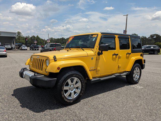 used 2015 Jeep Wrangler Unlimited car, priced at $17,504