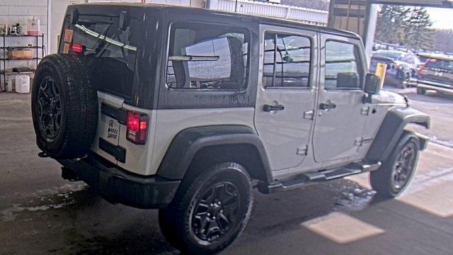 used 2015 Jeep Wrangler Unlimited car, priced at $17,400