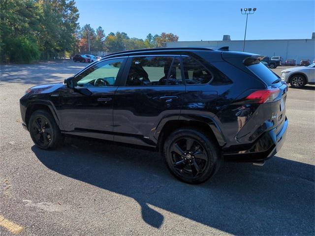 used 2021 Toyota RAV4 Hybrid car, priced at $31,080