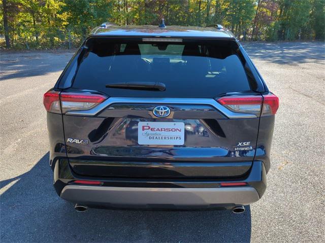 used 2021 Toyota RAV4 Hybrid car, priced at $31,080