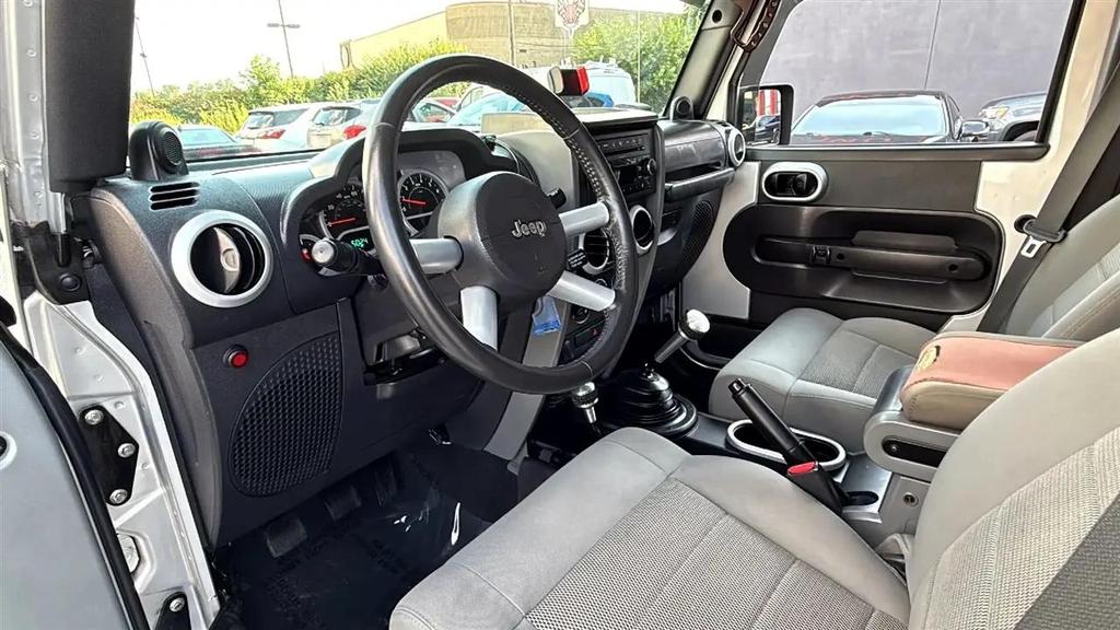 used 2009 Jeep Wrangler Unlimited car, priced at $11,995