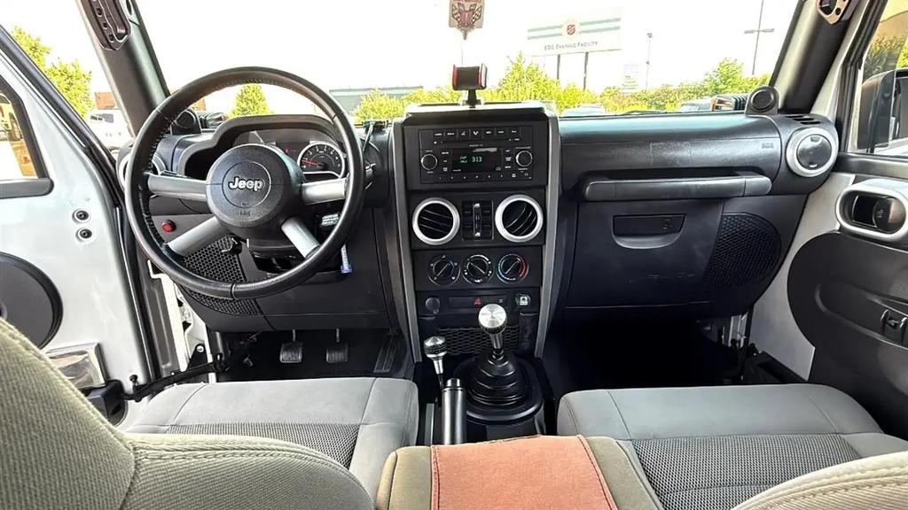 used 2009 Jeep Wrangler Unlimited car, priced at $11,995