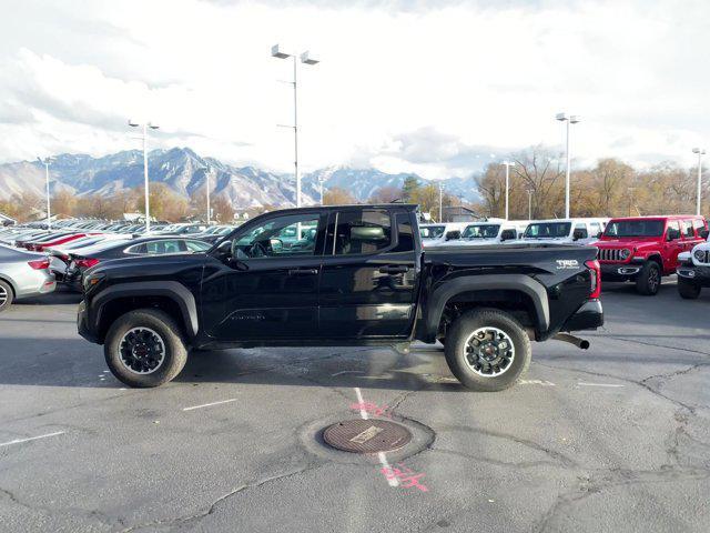 used 2025 Toyota Tacoma car, priced at $38,324