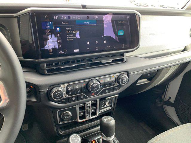 used 2025 Jeep Wrangler car, priced at $38,803