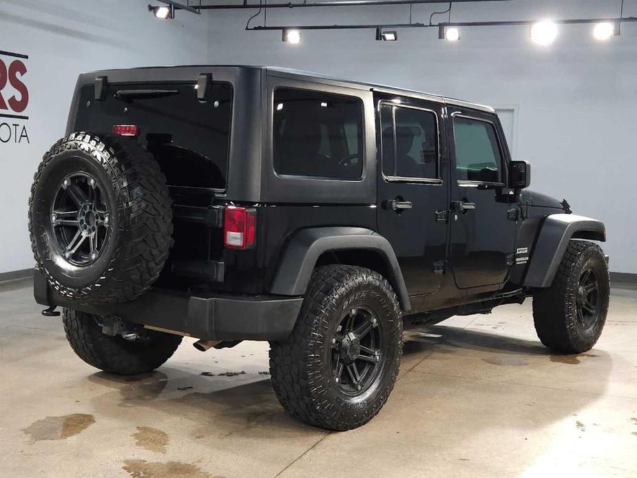 used 2015 Jeep Wrangler Unlimited car, priced at $21,708