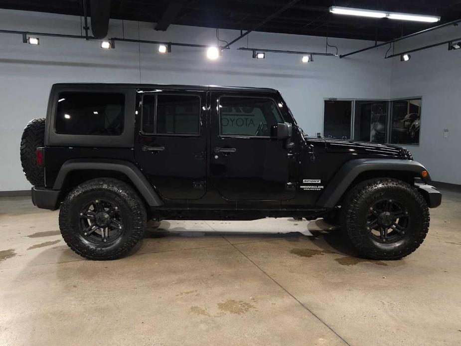 used 2015 Jeep Wrangler Unlimited car, priced at $21,708