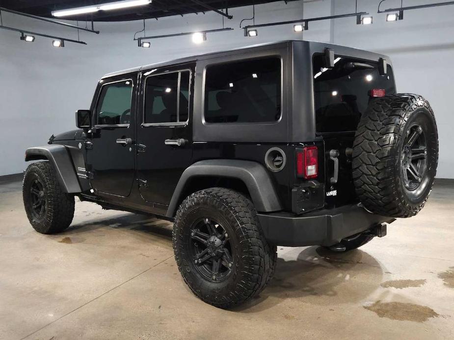 used 2015 Jeep Wrangler Unlimited car, priced at $21,708