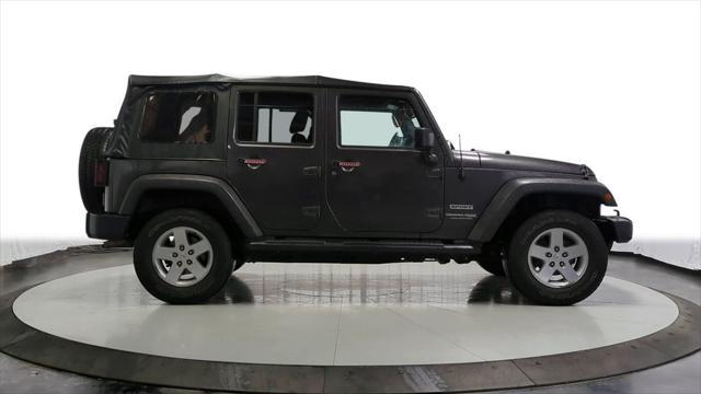 used 2018 Jeep Wrangler JK Unlimited car, priced at $21,295