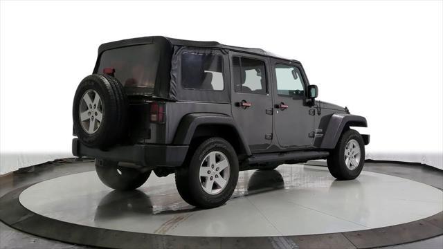 used 2018 Jeep Wrangler JK Unlimited car, priced at $21,295