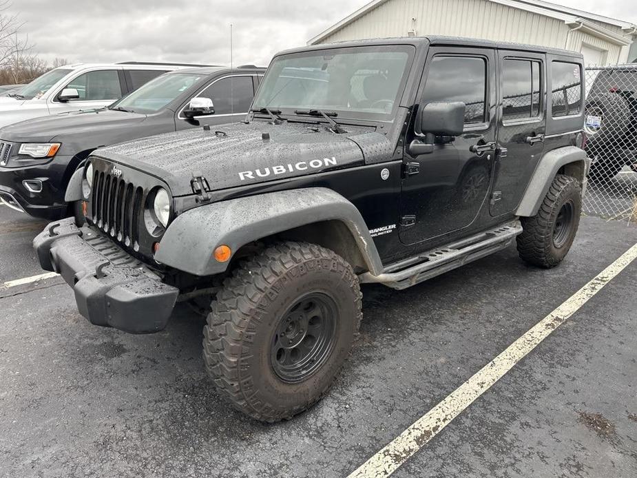 used 2011 Jeep Wrangler Unlimited car, priced at $15,900