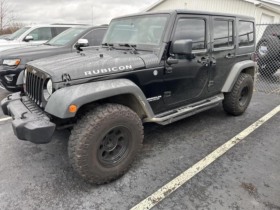 used 2011 Jeep Wrangler Unlimited car, priced at $15,900