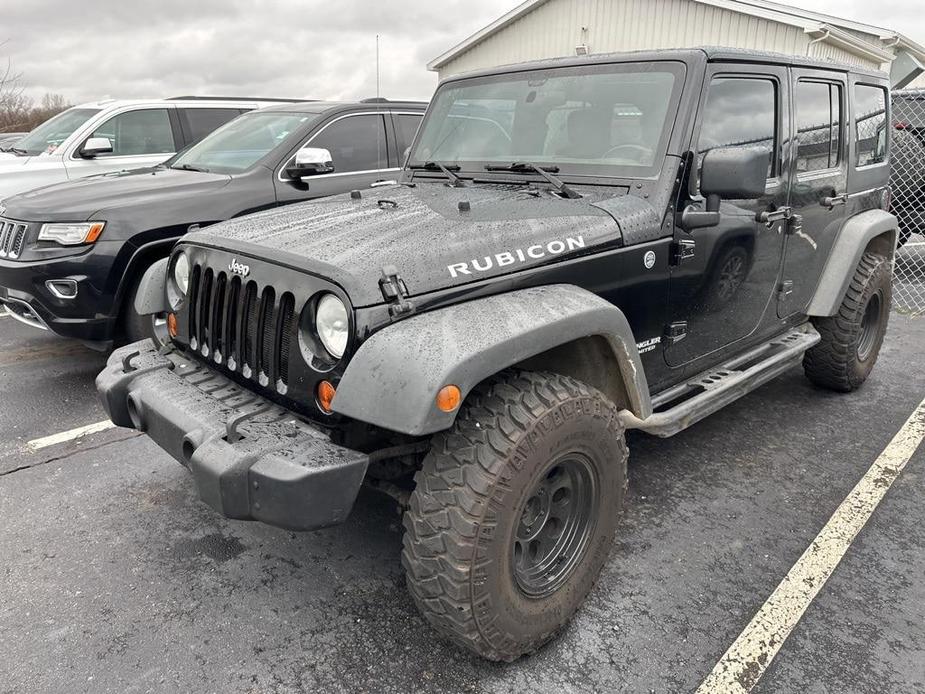 used 2011 Jeep Wrangler Unlimited car, priced at $15,900