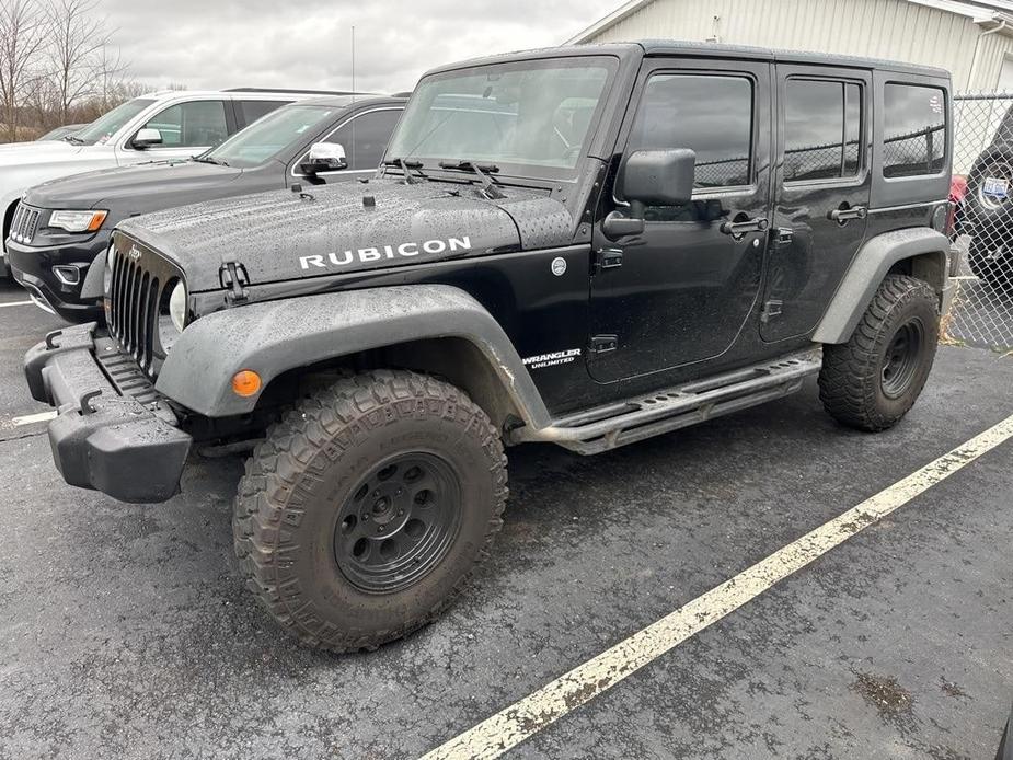 used 2011 Jeep Wrangler Unlimited car, priced at $15,900