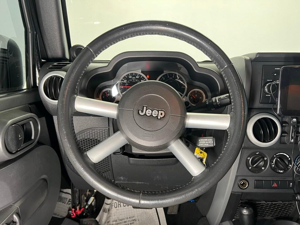 used 2010 Jeep Wrangler Unlimited car, priced at $10,900