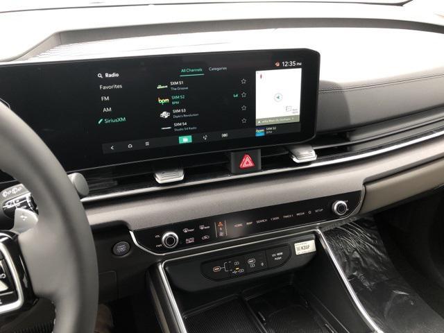 new 2025 Kia Carnival Hybrid car, priced at $49,455