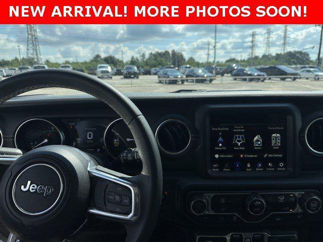 used 2023 Jeep Wrangler 4xe car, priced at $32,299