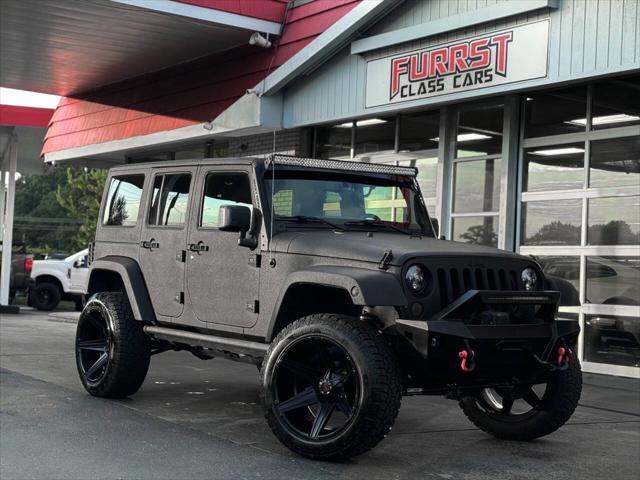 used 2016 Jeep Wrangler Unlimited car, priced at $30,495