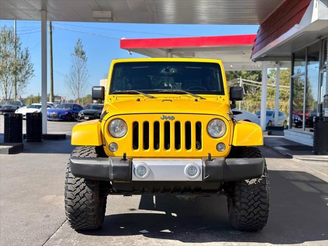 used 2015 Jeep Wrangler Unlimited car, priced at $22,999