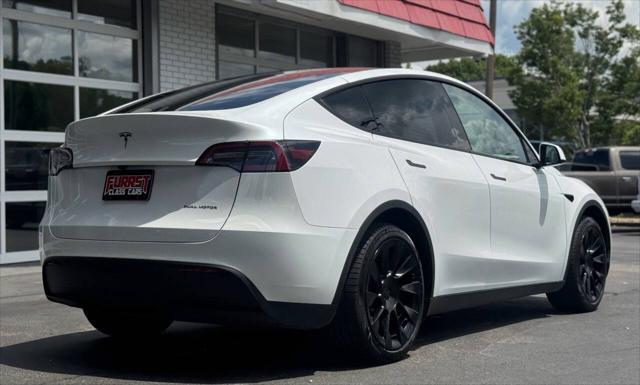 used 2023 Tesla Model Y car, priced at $32,999
