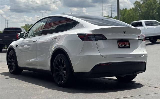 used 2023 Tesla Model Y car, priced at $32,999