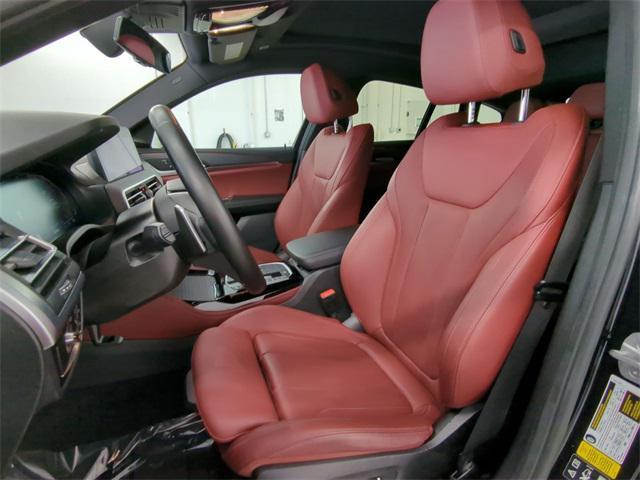 used 2024 BMW X4 car, priced at $46,500