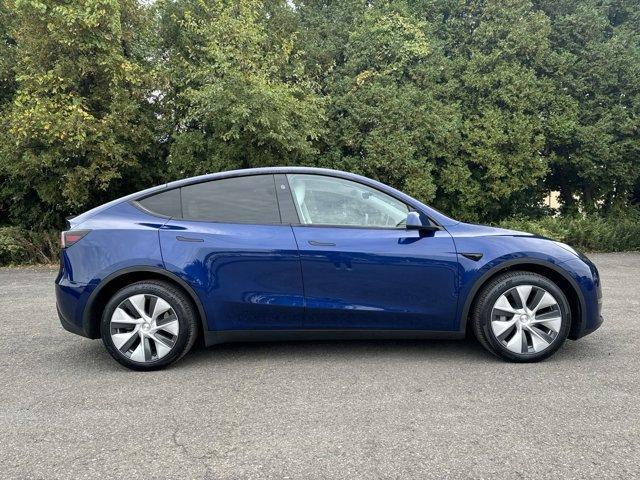 used 2024 Tesla Model Y car, priced at $35,999