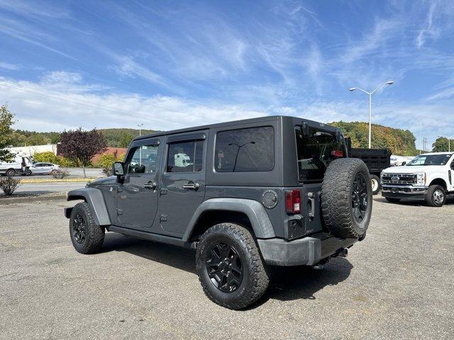 used 2017 Jeep Wrangler Unlimited car, priced at $23,465