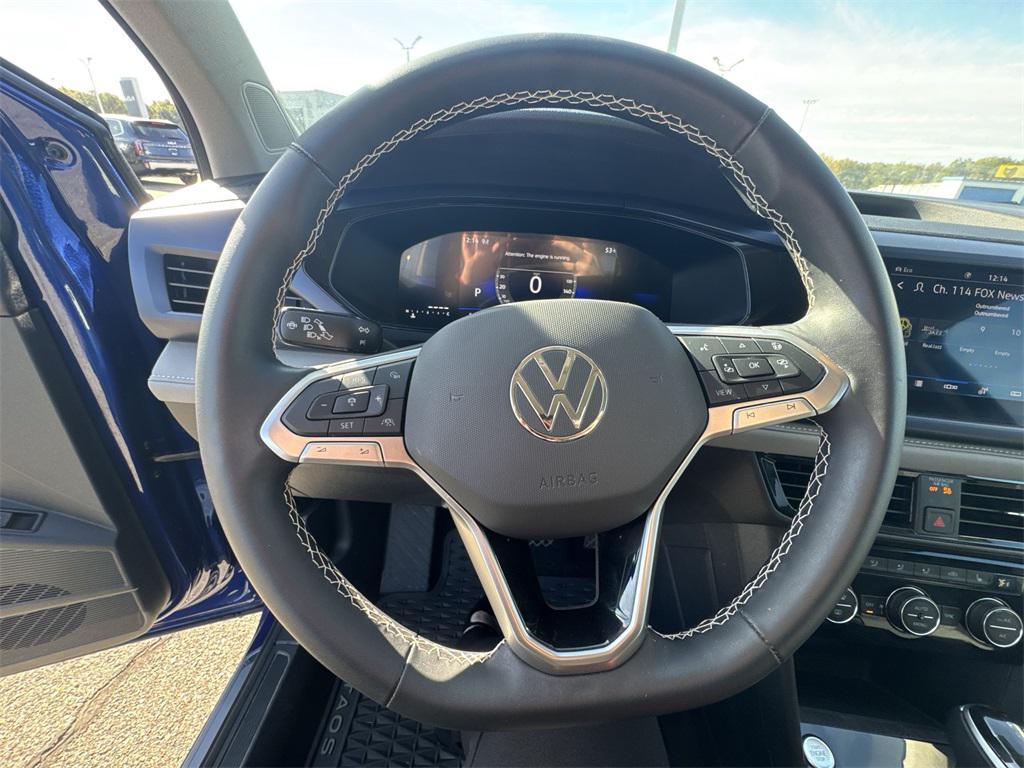 used 2024 Volkswagen Taos car, priced at $24,677