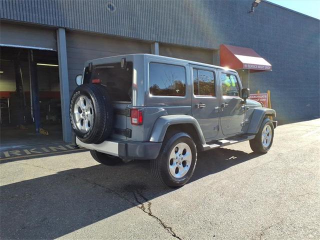 used 2015 Jeep Wrangler Unlimited car, priced at $16,646