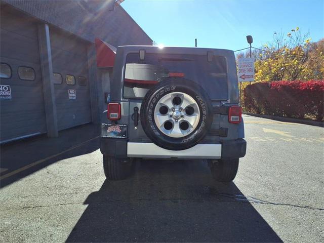 used 2015 Jeep Wrangler Unlimited car, priced at $16,646