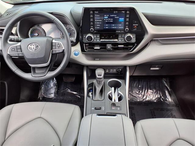 used 2022 Toyota Highlander Hybrid car, priced at $38,440