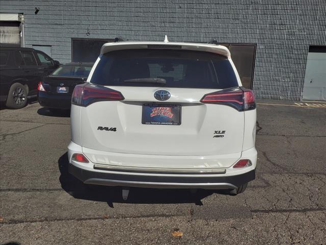 used 2018 Toyota RAV4 car, priced at $19,003