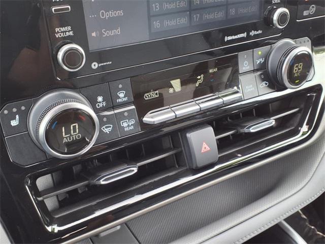 used 2021 Toyota Highlander car, priced at $34,321