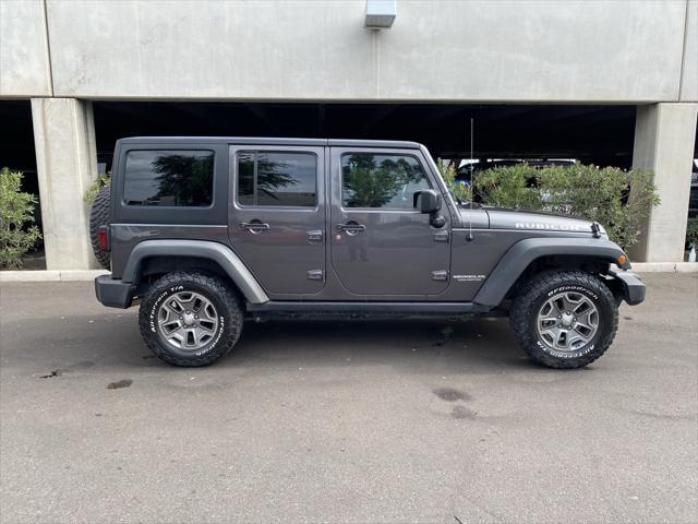 used 2017 Jeep Wrangler Unlimited car, priced at $29,273