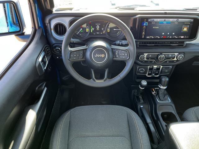 used 2024 Jeep Wrangler 4xe car, priced at $33,573