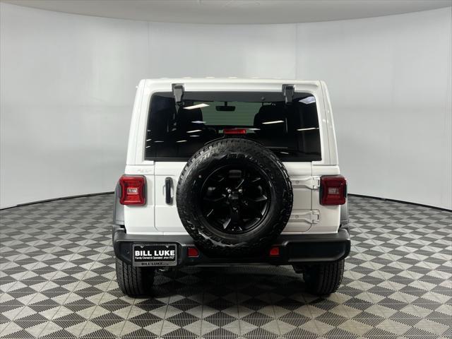 used 2021 Jeep Wrangler Unlimited car, priced at $36,273