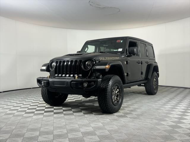 used 2022 Jeep Wrangler Unlimited car, priced at $57,273