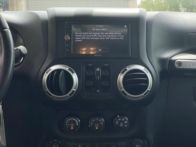 used 2017 Jeep Wrangler Unlimited car, priced at $25,973