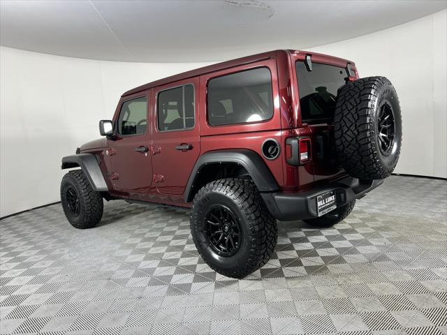 used 2021 Jeep Wrangler Unlimited car, priced at $33,573
