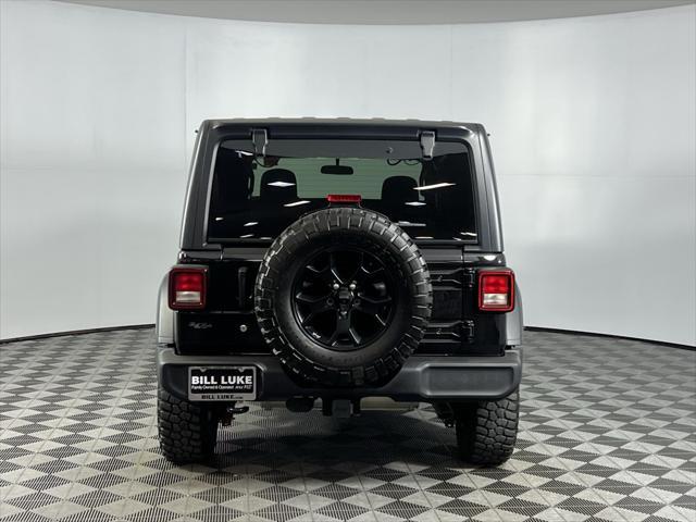 used 2021 Jeep Wrangler Unlimited car, priced at $33,473