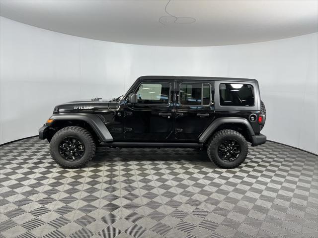 used 2021 Jeep Wrangler Unlimited car, priced at $33,473