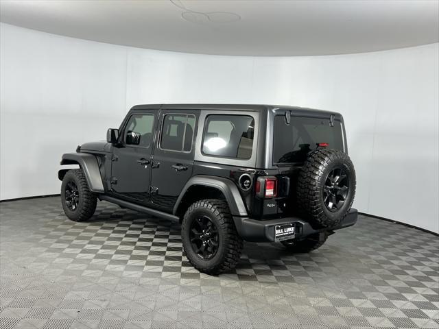 used 2021 Jeep Wrangler Unlimited car, priced at $33,473